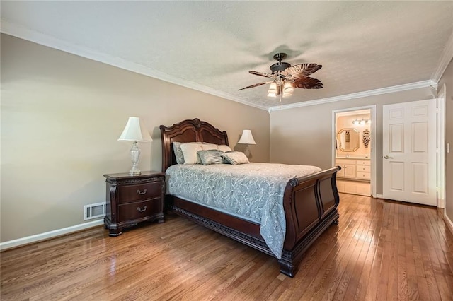 3592 Midvale Cv, Tucker, GA 30084 - bedroom with light wood-style floors, baseboards, ceiling fan, ornamental molding, and connected bathroom