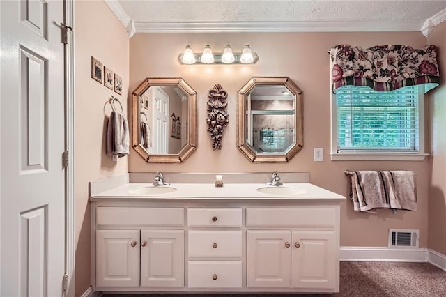 3592 Midvale Cv, Tucker, GA 30084 - full bathroom featuring double vanity, crown molding, a textured ceiling, and baseboards