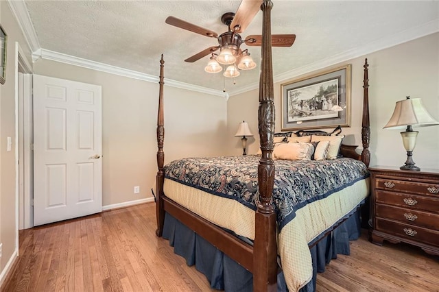 3592 Midvale Cv, Tucker, GA 30084 - bedroom featuring light wood-type flooring, baseboards, ornamental molding, and a ceiling fan