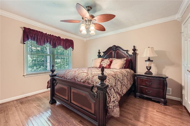 3592 Midvale Cv, Tucker, GA 30084 - bedroom with crown molding, baseboards, wood finished floors, and ceiling fan