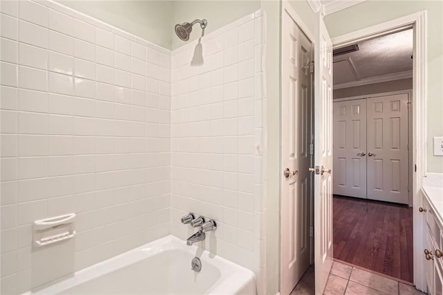 3592 Midvale Cv, Tucker, GA 30084 - bathroom with crown molding, shower / bath combination, vanity, and tile patterned flooring