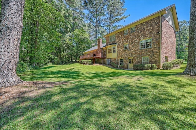 3592 Midvale Cv, Tucker, GA 30084 - view of grassy yard featuring a wooden deck and cooling unit