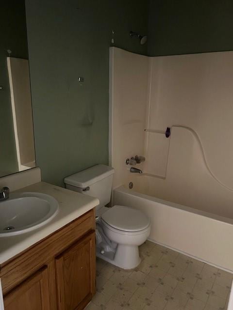 full bathroom featuring toilet, shower / tub combination, vanity, and tile patterned floors