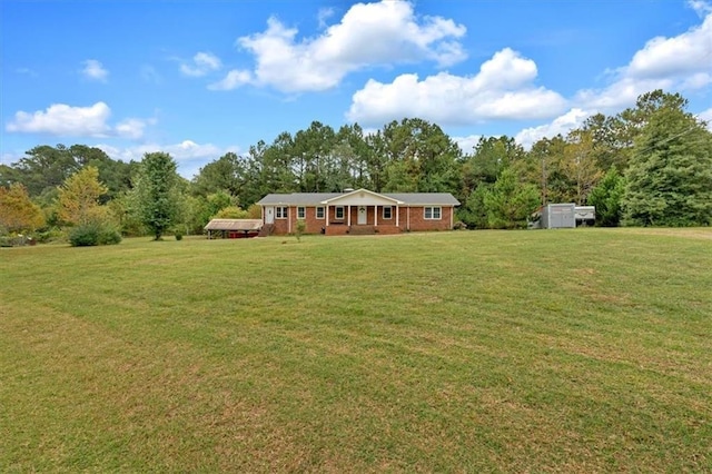 view of yard featuring covered porch