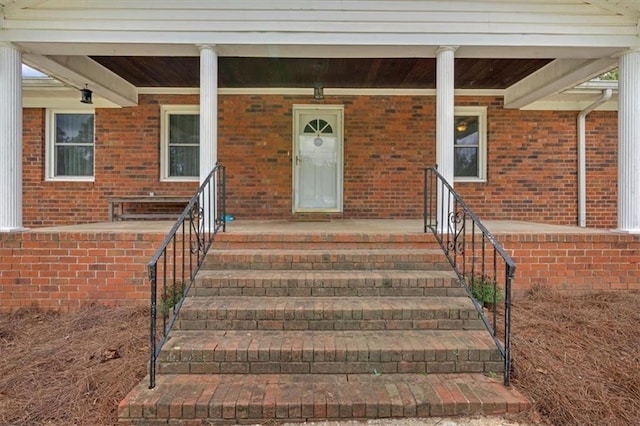 doorway to property with covered porch