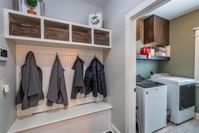 2103 Sourwood Ct, Monroe, GA 30656 - laundry area with separate washer and dryer and cabinet space