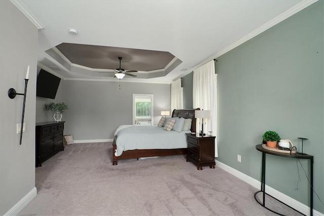 2103 Sourwood Ct, Monroe, GA 30656 - carpeted bedroom featuring a raised ceiling, crown molding, and a ceiling fan
