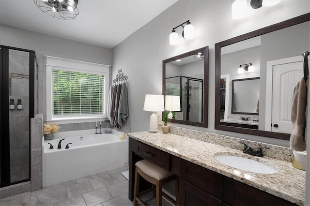 2103 Sourwood Ct, Monroe, GA 30656 - bathroom featuring a shower stall, a bath, and vanity