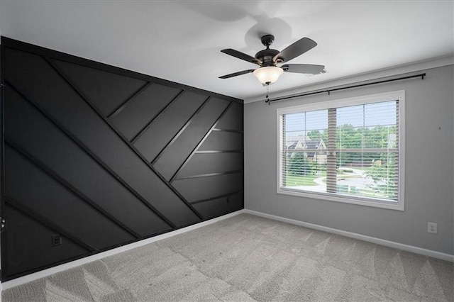 2103 Sourwood Ct, Monroe, GA 30656 - spare room featuring light carpet and a ceiling fan
