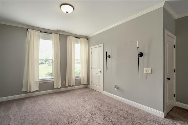 2103 Sourwood Ct, Monroe, GA 30656 - carpeted empty room with ornamental molding and baseboards