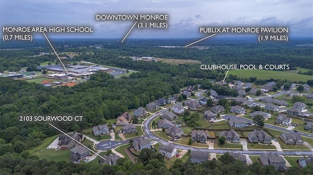 2103 Sourwood Ct, Monroe, GA 30656 - aerial view of property and surrounding area with a heavily wooded area