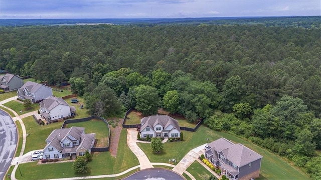 2103 Sourwood Ct, Monroe, GA 30656 - aerial perspective of suburban area featuring a heavily wooded area