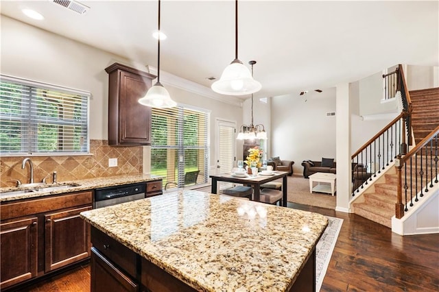 7946 White Oak Loop, Stonecrest, GA 30038 - kitchen with a sink, dishwasher, dark wood finished floors, light stone countertops, and a center island