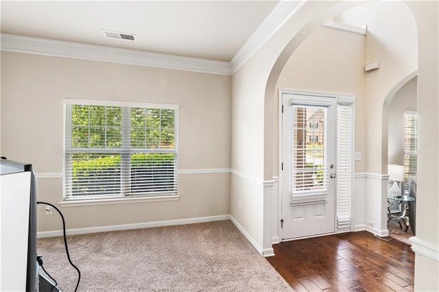 7946 White Oak Loop, Stonecrest, GA 30038 - entryway with arched walkways, healthy amount of natural light, crown molding, and baseboards