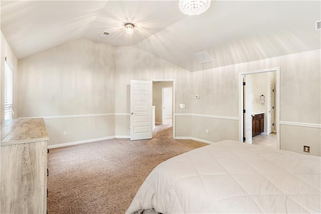 7946 White Oak Loop, Stonecrest, GA 30038 - bedroom featuring lofted ceiling, carpet floors, and ensuite bath