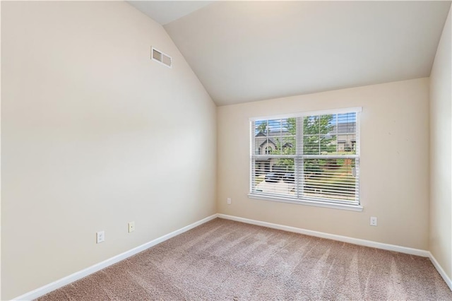 7946 White Oak Loop, Stonecrest, GA 30038 - carpeted empty room with lofted ceiling and baseboards