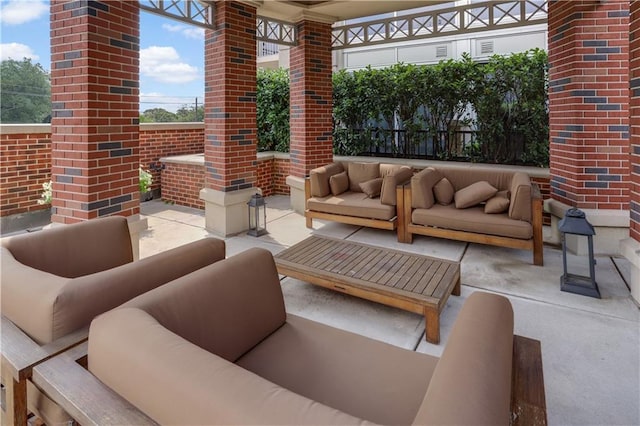 view of patio with fence and an outdoor living space
