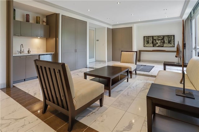 interior space featuring marble finish floor, indoor wet bar, and recessed lighting