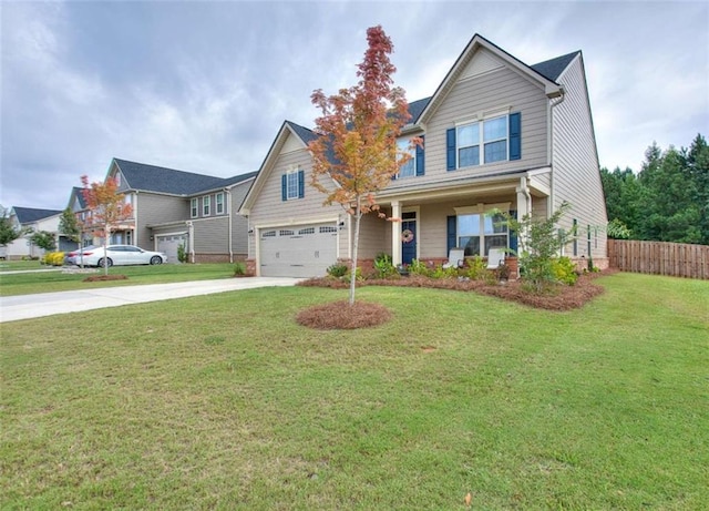 craftsman-style house featuring a garage, a front yard, and covered porch