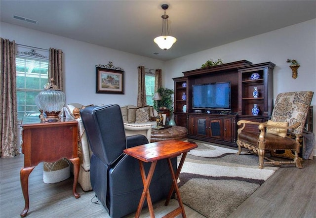 living room with light hardwood / wood-style floors