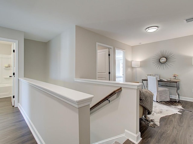 hallway featuring hardwood / wood-style floors