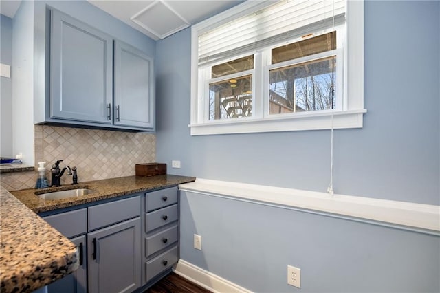 playroom with a raised ceiling, baseboards, dark wood-style flooring, and recessed lighting