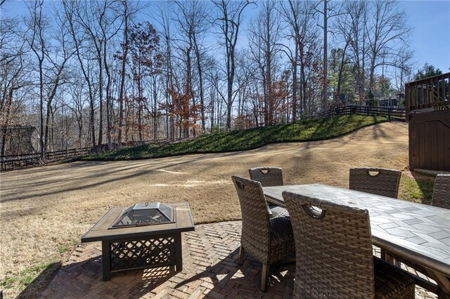 back of property featuring a sunroom, stairs, fence, a gate, and a residential view