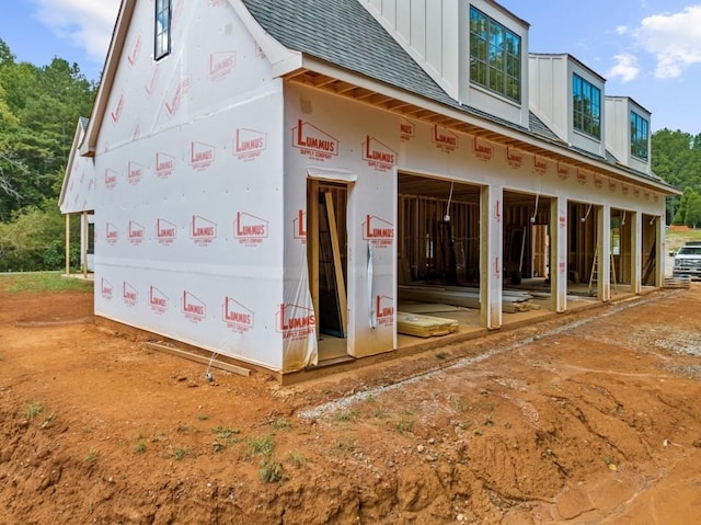 615 Hickory Flt, Milton, GA 30004 - view of property exterior with roof with shingles and board and batten siding