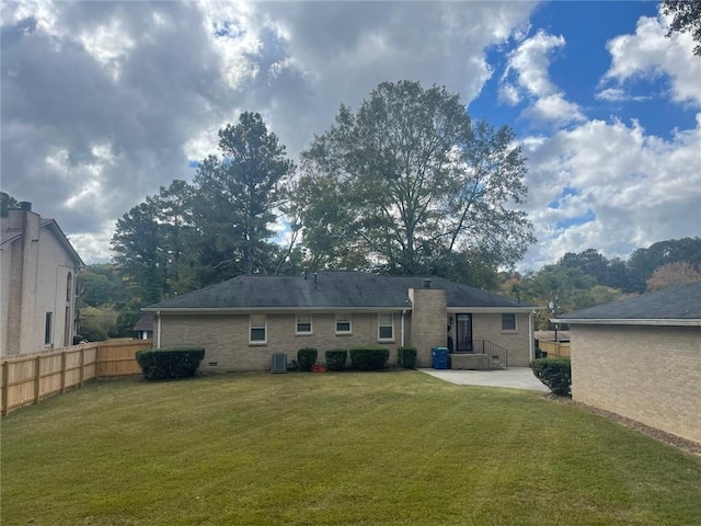 3845 Pebble Beach Dr, Atlanta, GA 30349 - rear view of property with a patio and brick siding