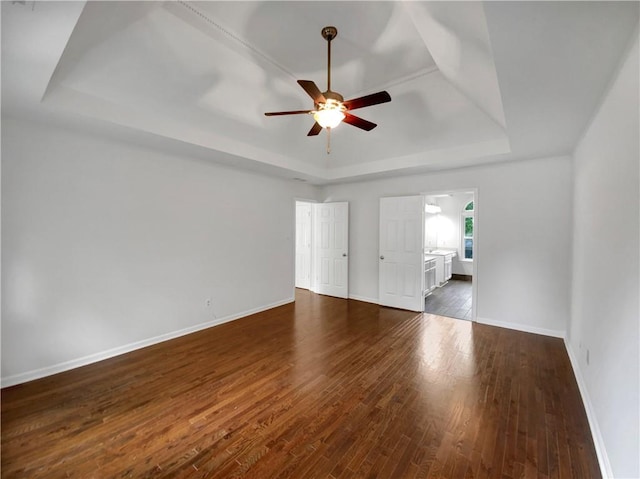 110 Wyngate Way, Fayetteville, GA 30215 - spare room with a tray ceiling, a ceiling fan, and wood finished floors
