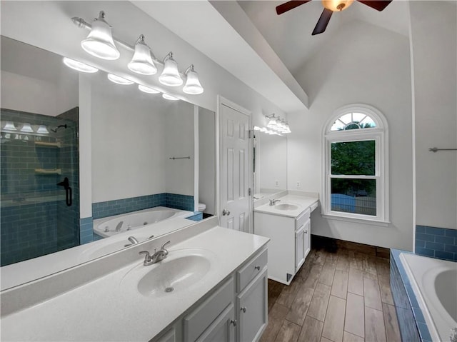 110 Wyngate Way, Fayetteville, GA 30215 - full bathroom with two vanities, a garden tub, ceiling fan, a stall shower, and vaulted ceiling