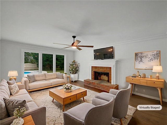 110 Wyngate Way, Fayetteville, GA 30215 - living room with wood finished floors, ceiling fan, crown molding, and a fireplace