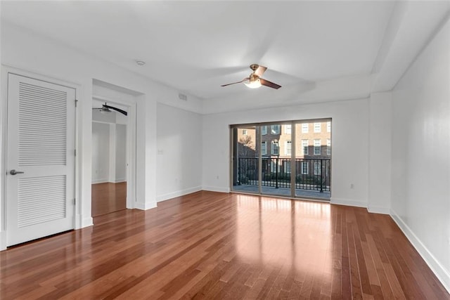 unfurnished room featuring hardwood / wood-style floors