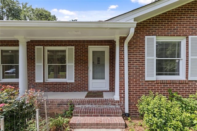 entrance to property with a porch