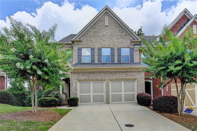 4165 Hammond Bridge Dr, Suwanee, GA 30024 - view of front of house with an attached garage, concrete driveway, and brick siding
