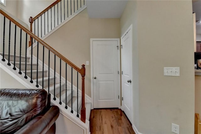 4165 Hammond Bridge Dr, Suwanee, GA 30024 - staircase with wood finished floors