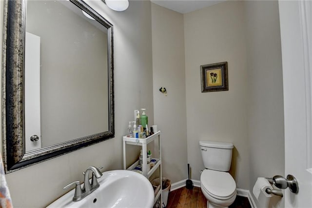 4165 Hammond Bridge Dr, Suwanee, GA 30024 - bathroom featuring toilet and wood finished floors