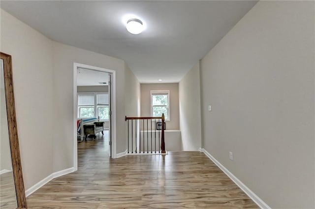 4165 Hammond Bridge Dr, Suwanee, GA 30024 - hall with an upstairs landing and light wood-style flooring