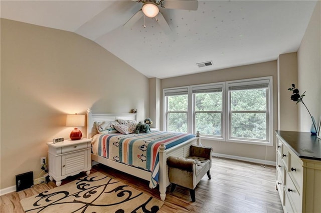 4165 Hammond Bridge Dr, Suwanee, GA 30024 - bedroom with lofted ceiling, light wood finished floors, and a ceiling fan