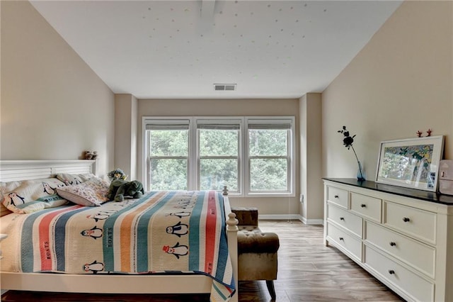 4165 Hammond Bridge Dr, Suwanee, GA 30024 - bedroom featuring light wood-style floors and baseboards