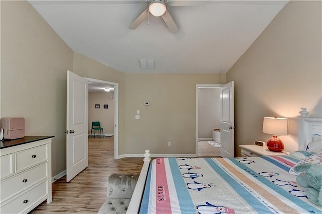 4165 Hammond Bridge Dr, Suwanee, GA 30024 - bedroom with light wood-style floors and a ceiling fan