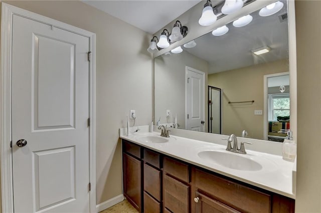 4165 Hammond Bridge Dr, Suwanee, GA 30024 - full bathroom with double vanity and baseboards