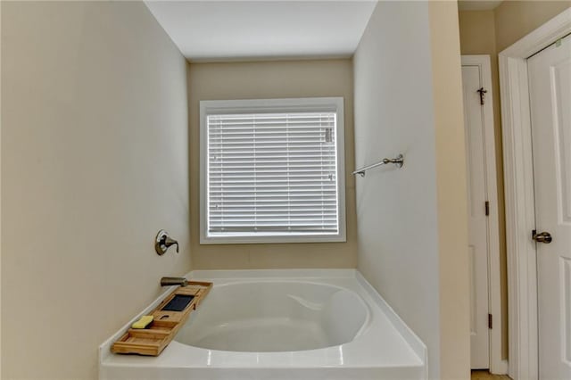 4165 Hammond Bridge Dr, Suwanee, GA 30024 - full bathroom with a garden tub
