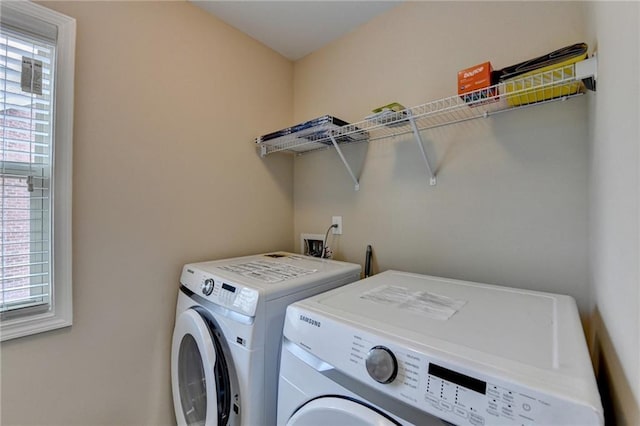4165 Hammond Bridge Dr, Suwanee, GA 30024 - washroom with washing machine and clothes dryer and plenty of natural light