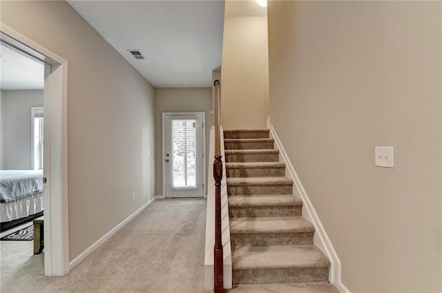 4165 Hammond Bridge Dr, Suwanee, GA 30024 - stairway with carpet floors and baseboards