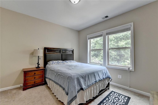 4165 Hammond Bridge Dr, Suwanee, GA 30024 - bedroom featuring baseboards and light carpet