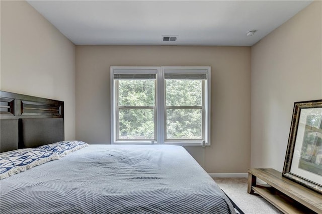 4165 Hammond Bridge Dr, Suwanee, GA 30024 - bedroom featuring light carpet and baseboards