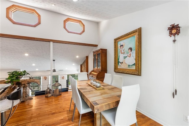 dining room featuring a ceiling fan, wood finished floors, recessed lighting, and a textured ceiling