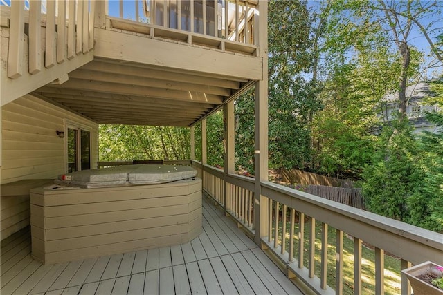 wooden terrace featuring fence