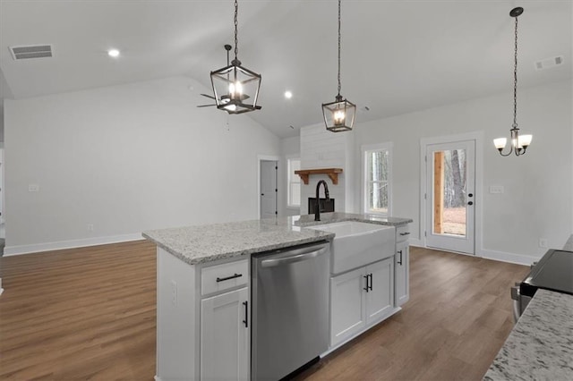 kitchen featuring an inviting chandelier, visible vents, and stainless steel appliances